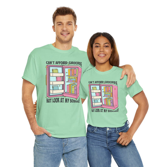 Funny Book Lover Unisex Heavy Cotton Tee – "Can't Afford Groceries, But Look at My Bookshelf!"